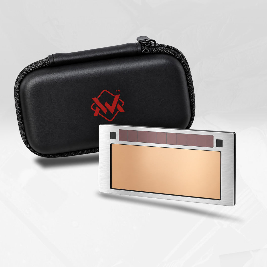 The Welding Magician welding lens with silver frame, gold-tone glass and black carrying case