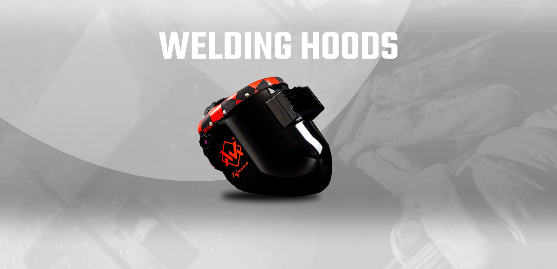 Welding hood with red accents on a gray background, labeled 'Welding Hoods'.