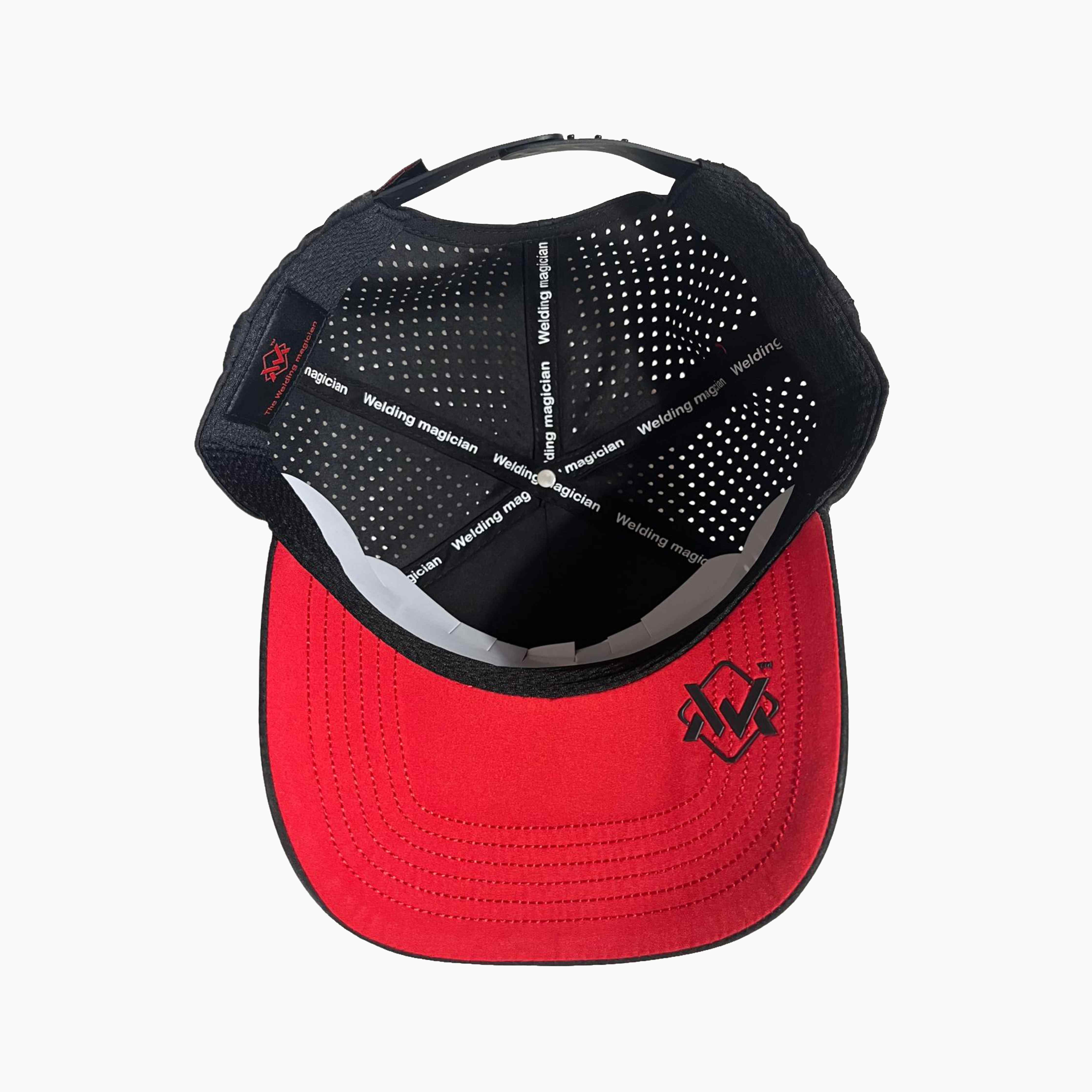 Inside view of Magician Performance Logo Cap in Black, showing red visor, black trim, and ventilated lining for airflow.