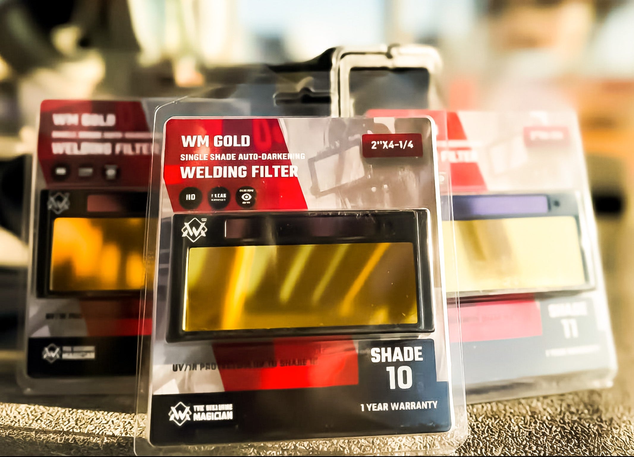 Packaged welding filter with visible brand logo on a blurred background