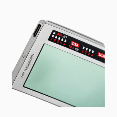 24K Pro Stainless Steel True Color Auto-Darkening Welding Lens close-up showing stainless steel frame, grind mode, sensitivity and delay controls
