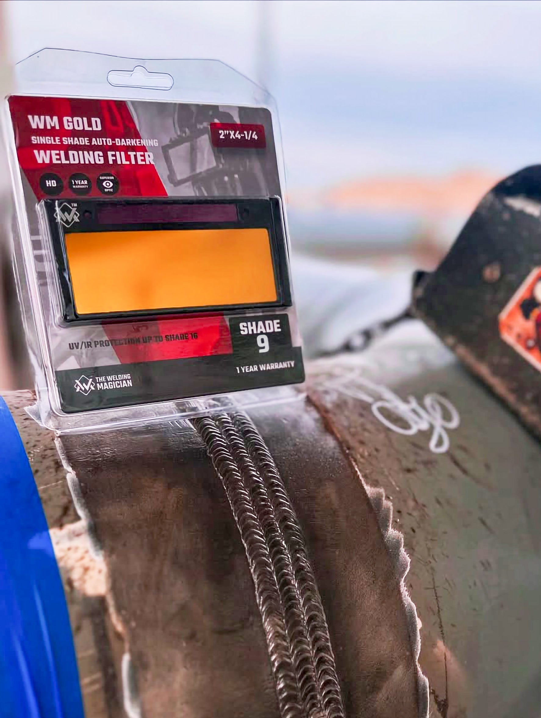 Welding filter in packaging on a workbench with blurred background