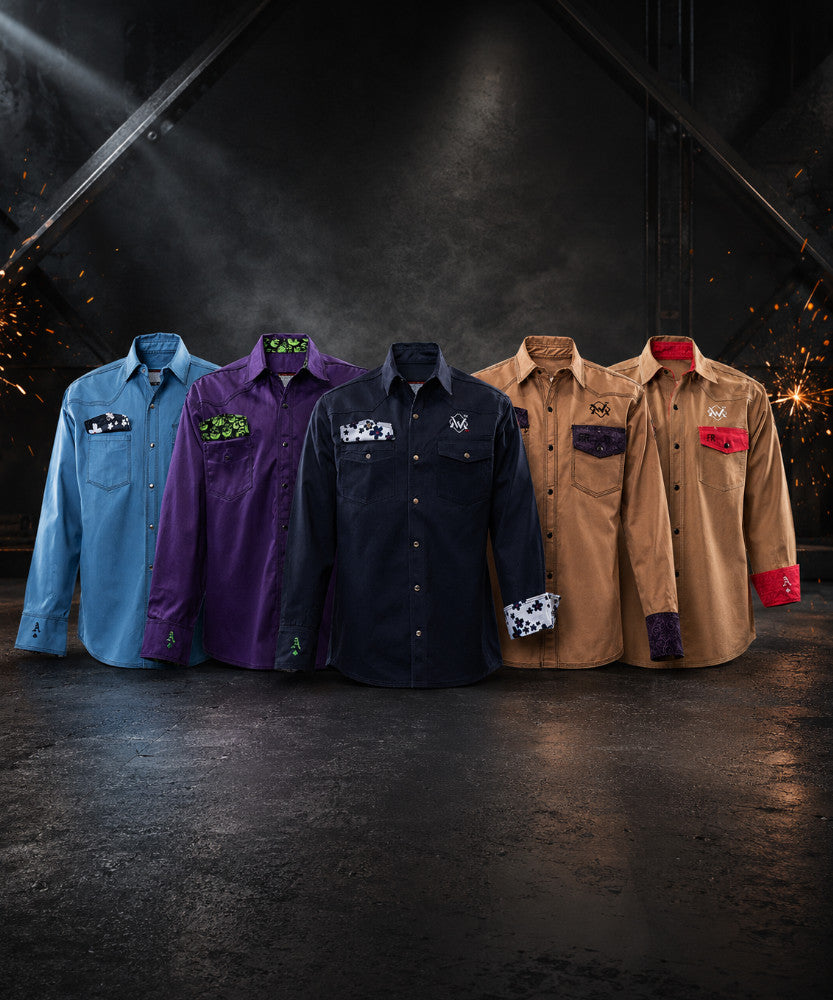 Five shirts in different colors on a dark background