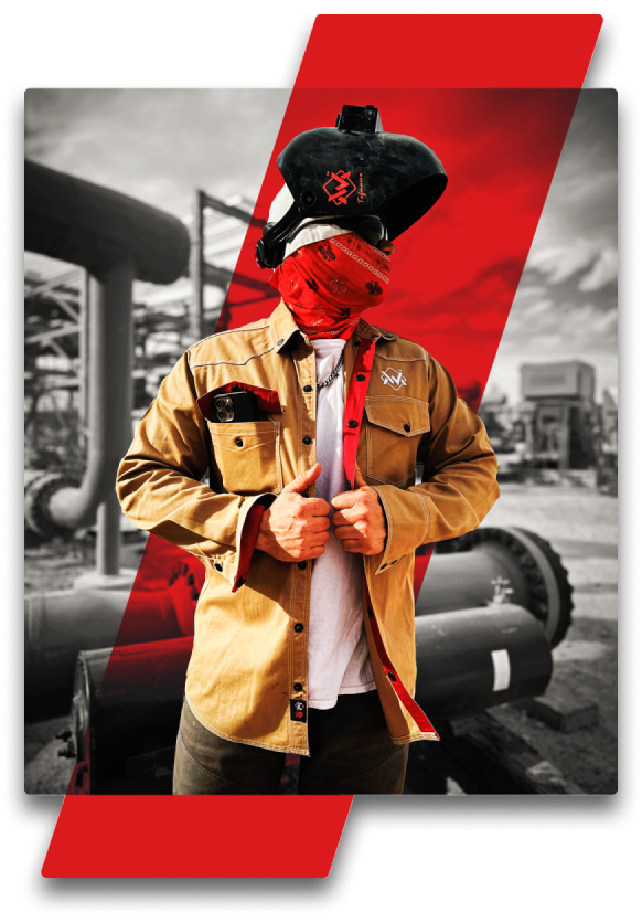 Person wearing a tan jacket and black hat with red bandana in an industrial setting