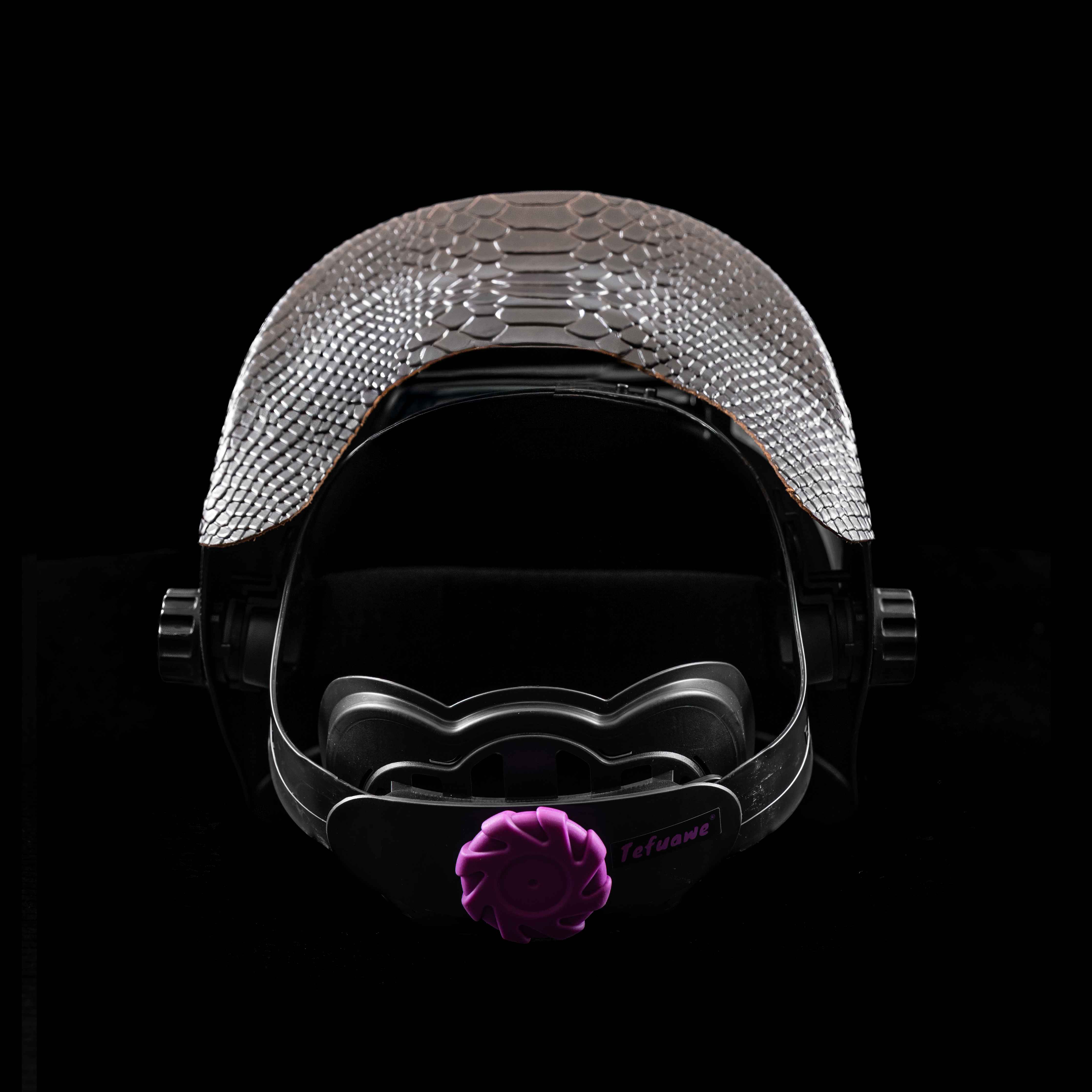 Inside view of EliteWave Welding Hood showing brown snake leather headband and ergonomic fit.