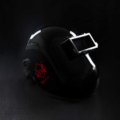 BlazeShield Flip Lens Welding Hood in black with red logo, side view showing durable shell and flip lens.