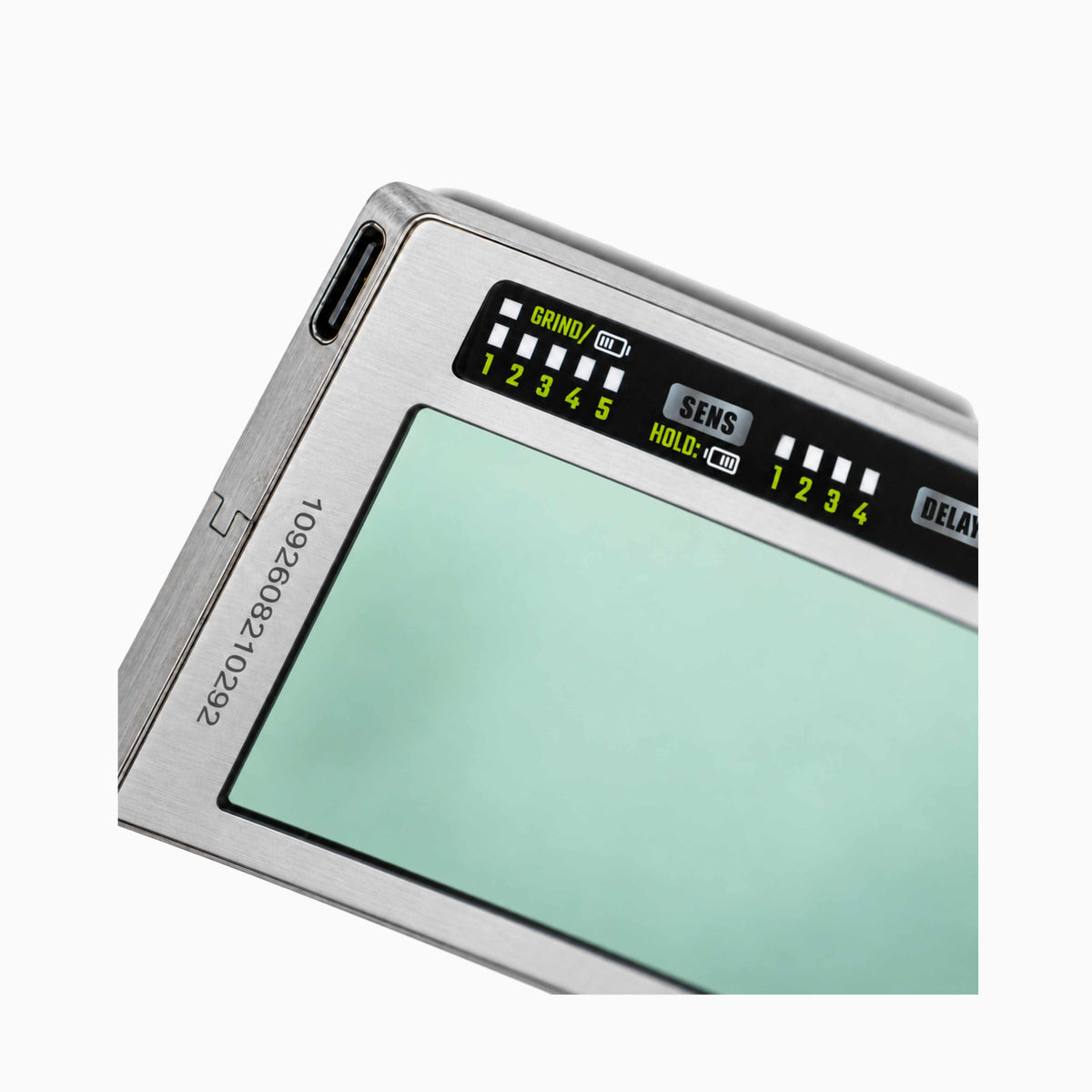 WM Stainless Steel True Color Digital Welding Lens close-up showing stainless steel frame, digital controls and USB-C charging port