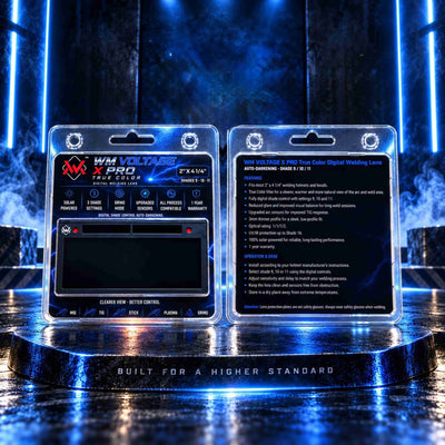 Front and back packaging of the WM Voltage X Pro True Color auto-darkening welding lens on a welding table
